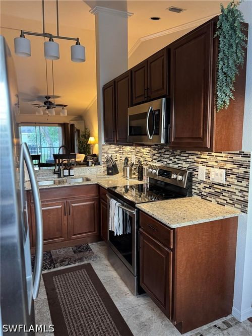 q203-181 Grand Oaks Way, NAPLES, FL, 34110-9214 | Card Image