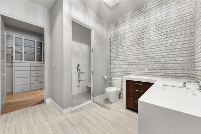 Bathroom with vanity and a stall shower | Image 26