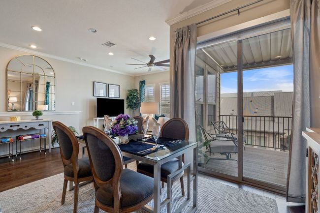 2nd Floor Dining area featuring ornamental molding, a healthy amount of sunlight, and wood finished floors | Image 16
