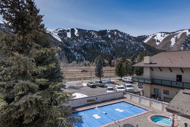 View of pool featuring a mountain view | Image 21