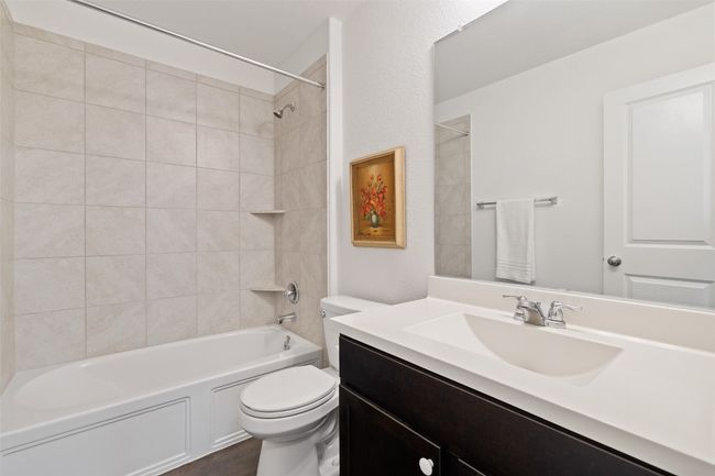 Full bathroom featuring vanity and shower / washtub combination | Image 27