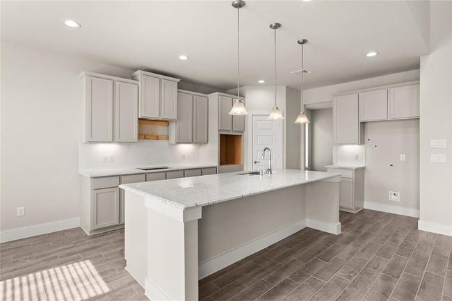 This photo is for illustrative purposes only and is not to be considered an exact replica of the finished home. Rendering does not match the finished product in terms of features, colors, landscaping, etc. Pricing, specifications, square footage and materials are subject to change at any time and without notice. | Image 6