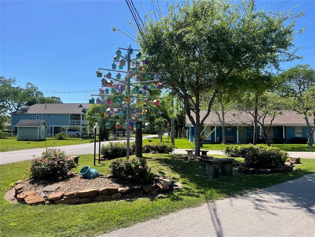 Nestled in a vibrant neighborhood, enjoy easy access to numerous parks, including the charming Bird House Park. | Image 48