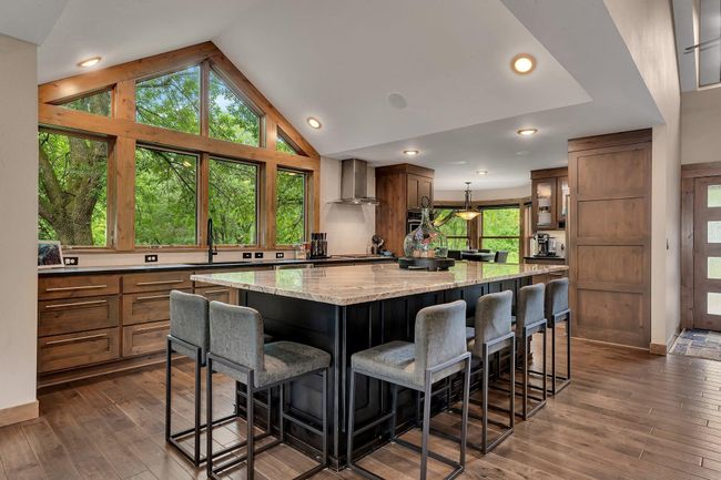 Beautiful and spacious 4.6 by 10-foot center island—perfect for cooking, serving, and gathering. | Image 11