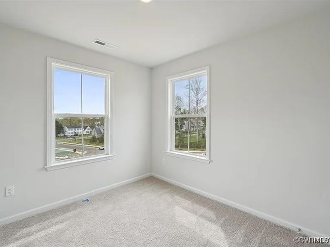 Unfurnished room featuring baseboards and carpet floors | Image 21