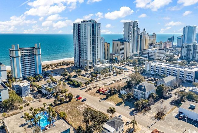 View of urban area with a nearby body of water | Image 30
