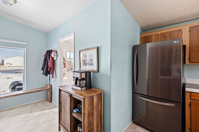 Kitchen to laundry area/back entry | Image 11