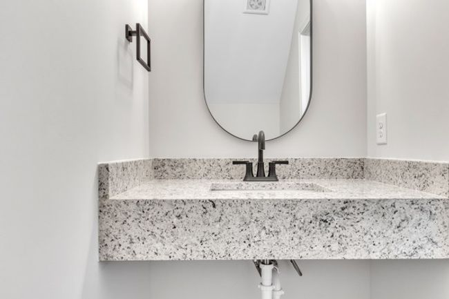 Half bath on 1st floor convenient to garage, office and front door. | Image 7