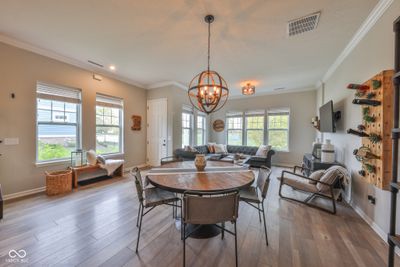 In between the kitchen and family room is the dining room. Great space for dining and long conversations! | Image 2