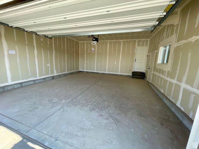 Garage featuring a garage door opener | Image 19