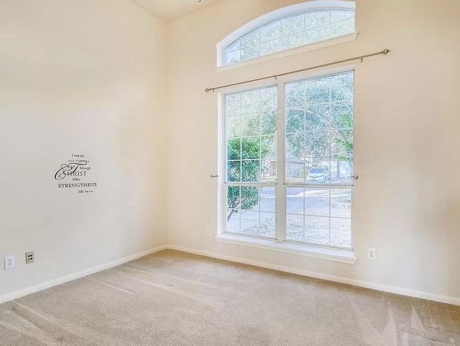 Carpeted empty room featuring baseboards | Image 13