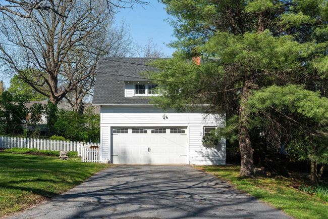 The detached garage has a great space above perfect for an office, a man cave, get togethers, teens, you name it. It's heated/cooled w/a mini split, has beautiful hardwood floors, and a kitchenette. | Image 55