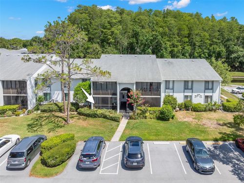 e1-1290 Pine Ridge Cir E, Tarpon Springs, FL, 34688-5405 | Card Image