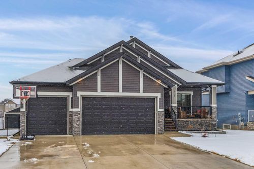425 Boulder Creek Way Se, Home with 4 bedrooms, 3 bathrooms and 6 parking in Langdon AB | Card Image