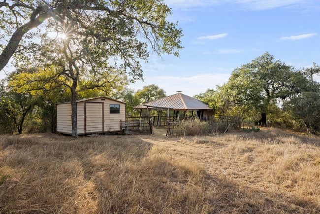 View of yard with a shed and a gazebo | Image 33