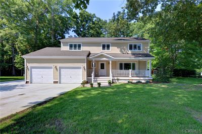 Expanded Driveway Remodeled Exterior | Image 1