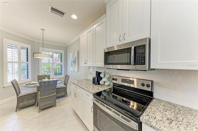 UNIT-104 - 13609 Messina Loop, Condo with 2 bedrooms, 2 bathrooms and null parking in Bradenton FL | Image 18