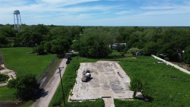 Birds eye view of property with a view of trees | Image 16