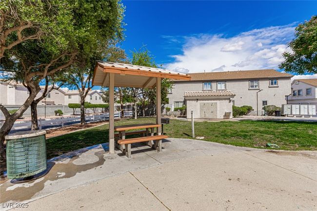 Surrounding community with a residential view, a patio area, and a yard | Image 25