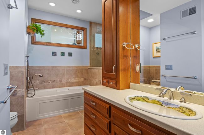 4173 Dornoch Ct, House other with 6 bedrooms, 4 bathrooms and null parking in Williamsburg MI | Image 51