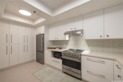 The kitchen has been thoughtfully designed and includes all new LED ceiling lighting with Lutron dimmer switches. | Image 3