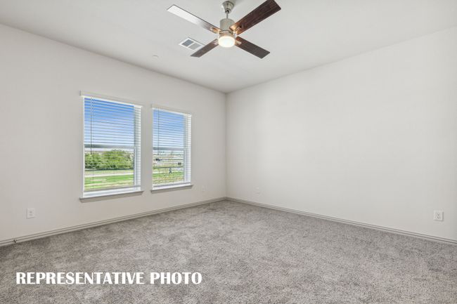 This peaceful light filled owner's bedroom is the perfect place to relax after a long day. REPRESENTATIVE PHOTO | Image 9