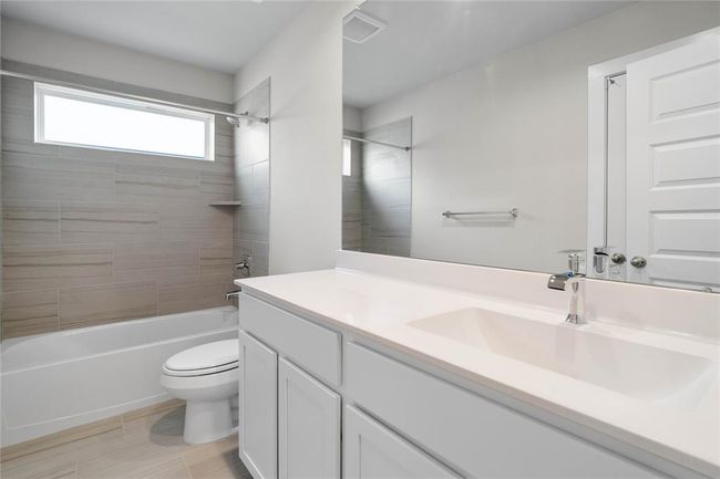 This photo is for illustrative purposes only and is not to be considered an exact replica of the finished home. Rendering does not match the finished product in terms of features, colors, landscaping, etc. Pricing, specifications, square footage and materials are subject to change at any time and without notice. | Image 12