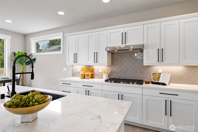 Photos are of a home in a different community and are for illustration purposes only to reflect typical finishes. May depict seller enhancements. Colors and options may vary. | Image 7