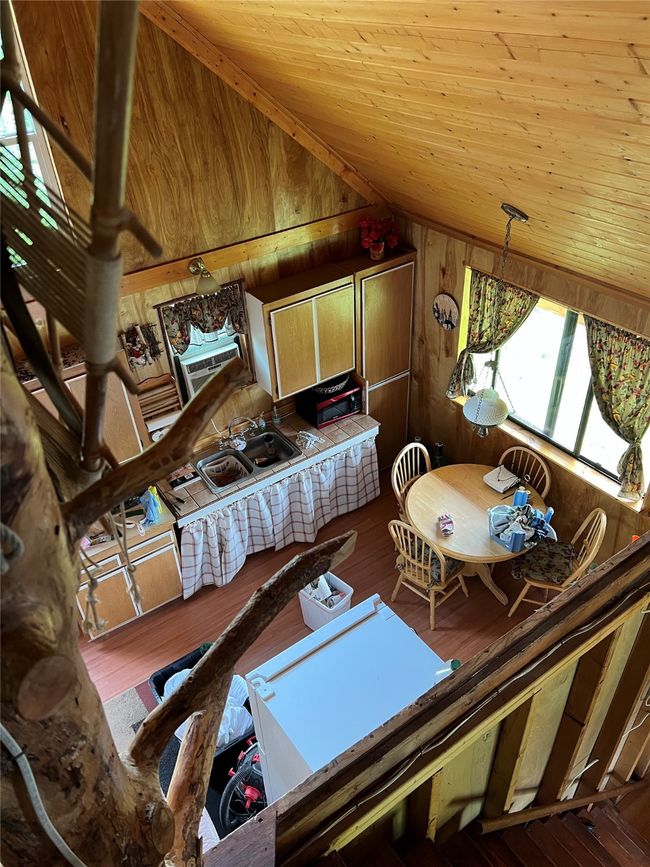 view from the loft to the kitchen area | Image 44