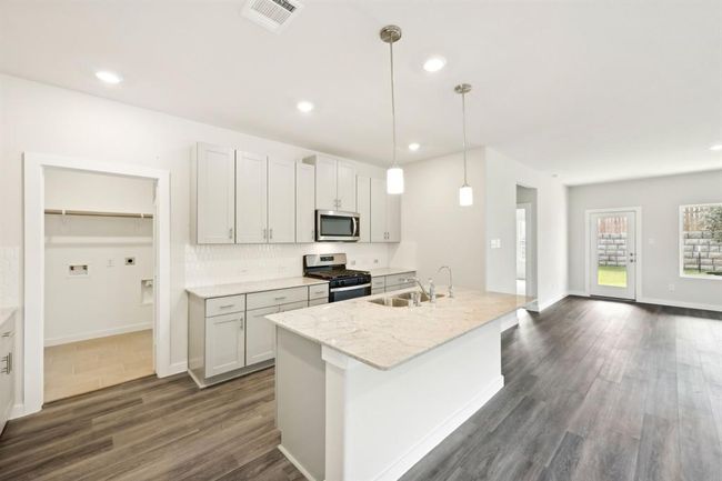 Photo is not of the actual home but is an inspirational photo of builder’s model home and may depict options, furnishings, and/or decorator features that are not included. | Image 4