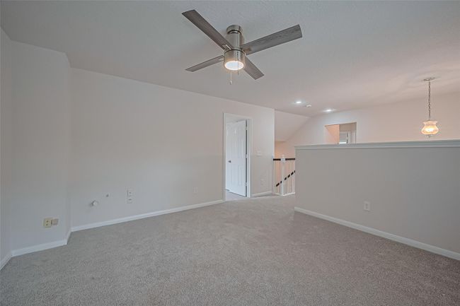 Upstairs loft area features all new carpet, freshly painted walls and ceilings, and offers a versatile space for lounging, working, or play. | Image 26