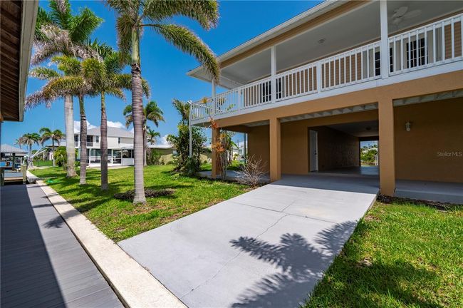 24261 Captain Kidd Blvd, House other with 3 bedrooms, 3 bathrooms and null parking in PUNTA GORDA FL | Image 46