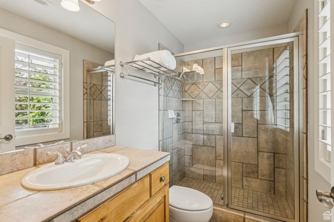 Bathroom featuring vanity and a stall shower | Image 50