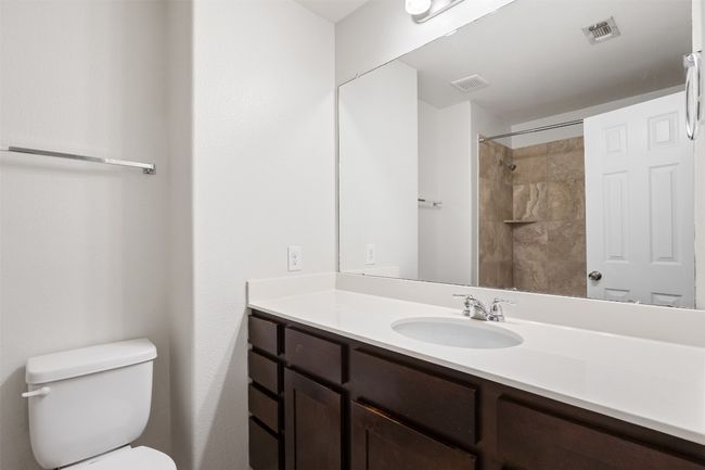 Bathroom with vanity and a tile shower | Image 26