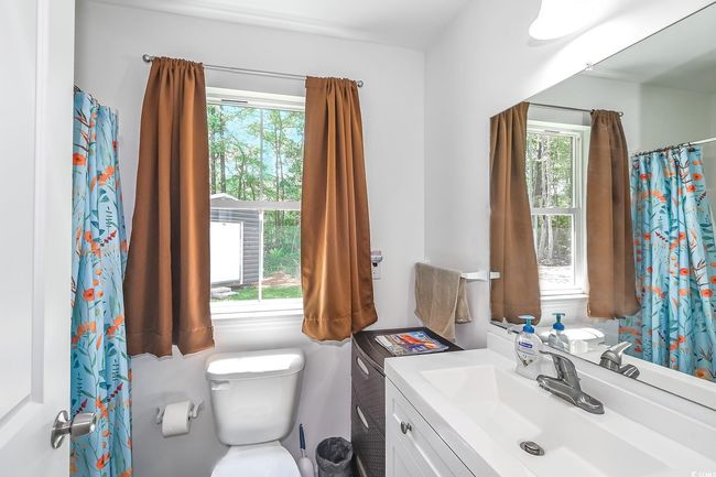 Bathroom with vanity and toilet | Image 13