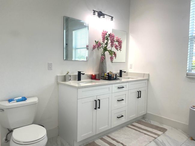 205 Sw Chapman Ave, House other with 4 bedrooms, 2 bathrooms and null parking in Port St. Lucie FL | Image 24