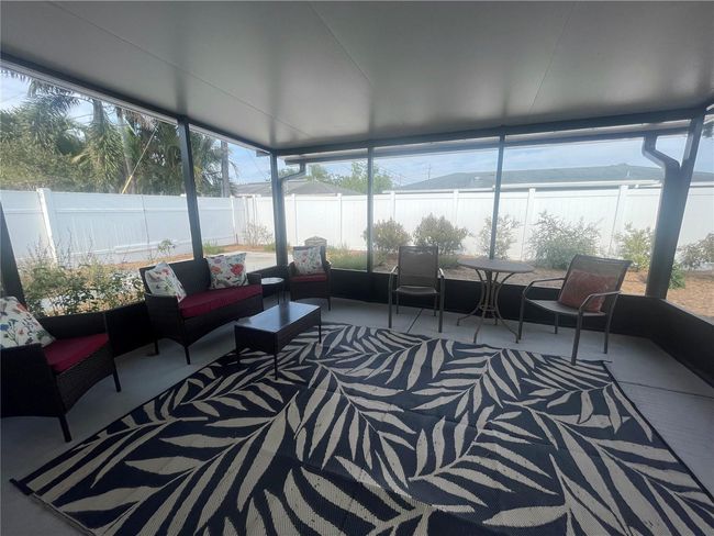 Living room with open floorplan. | Image 13