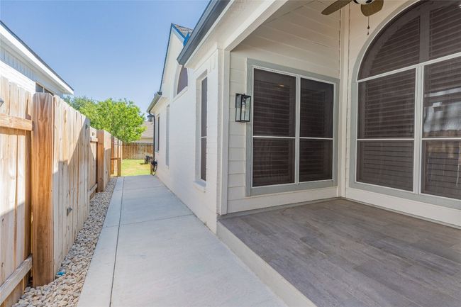 View of patio / terrace with a ceiling fan | Image 28
