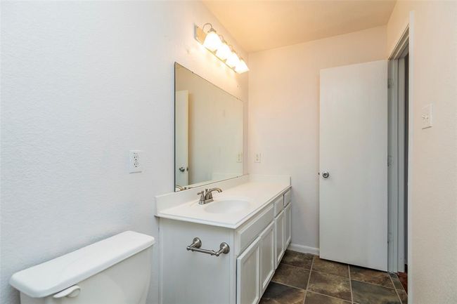 Full Bathrooms. Clean and functional bathrooms with modern fixtures. | Image 13