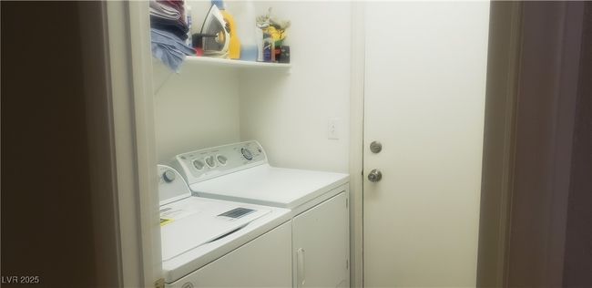Laundry room featuring laundry area and independent washer and dryer | Image 9