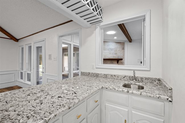 Bathroom featuring wood finished floors, recessed lighting, and wainscoting | Image 15