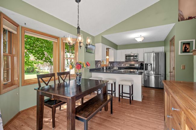 Entertaining is made easy with great sight lines on this upper level! | Image 12