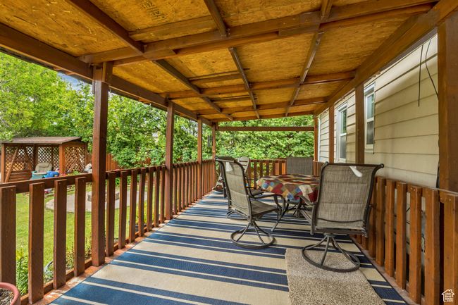 Large covered deck in the backyard | Image 19