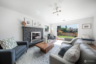 Bright and inviting living room. | Image 3