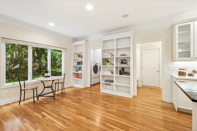 Large dining space in the kitchen and built-ins. | Image 8