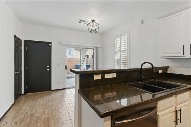 Penty of natural light, dishwasher, and a sink | Image 12