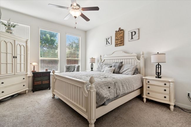 Private primary suite with a large walk-in closet. | Image 16