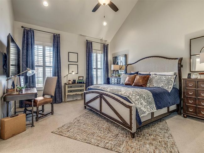 Bedroom with carpet, high vaulted ceiling, a ceiling fan, and recessed lighting | Image 14