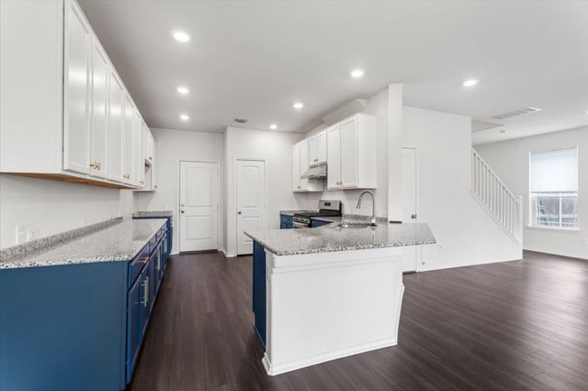 Kitchen open to living room | Image 7