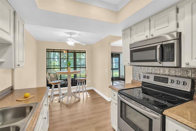 Perfect eat-in-kitchen space with tranquil green conservation views~ | Image 11